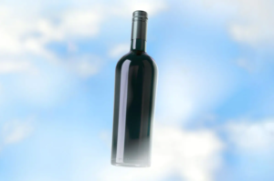 Bottle floating peacefully amongst the clouds with a beautiful blue sky behind it